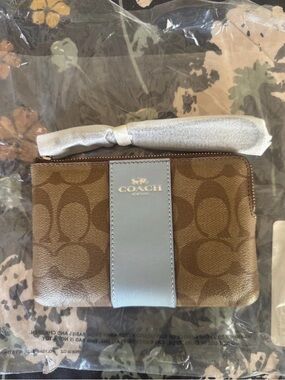 Coach Brown Signature Canvas Wristlet with Light Blue Accent